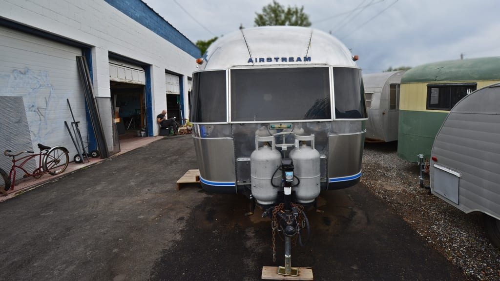 Dual propane tank setup and front hitch assembly with updated hardware on 1971 Airstream Sovereign