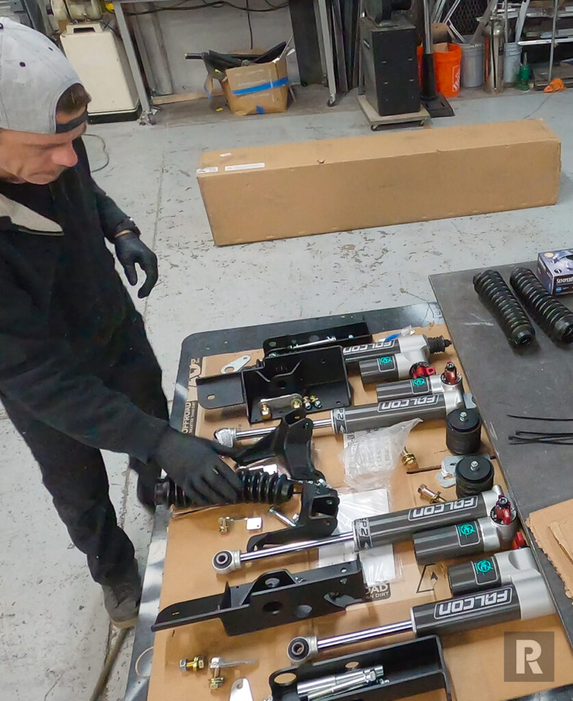 Inspecting of the Van Compass 4.3 suspension kit for Sprinter Vans