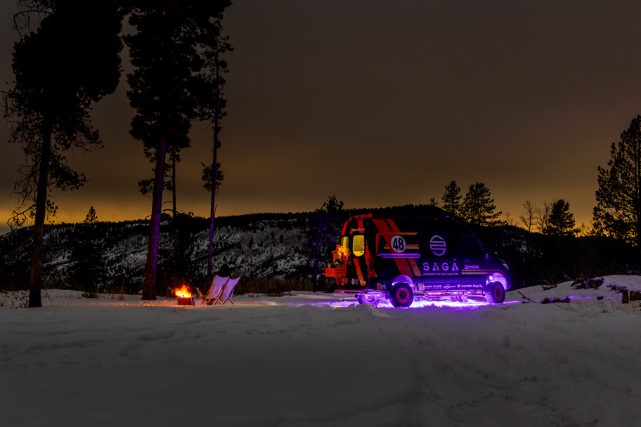 SAGA Vans Team Van Sprinter 144 exterior snowy lights campfire