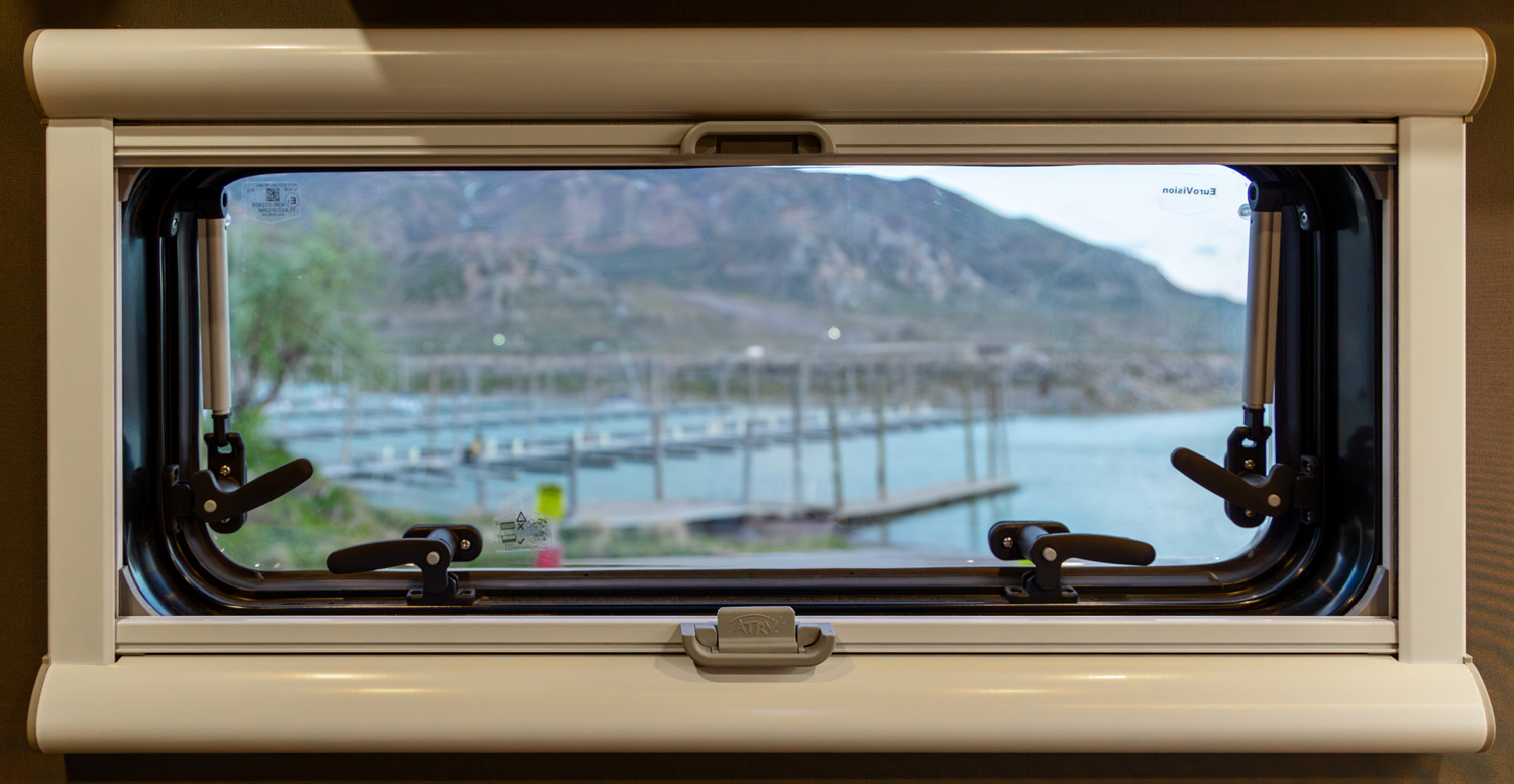 Arctic Turn pill style rear windows with shades and bugscreen
