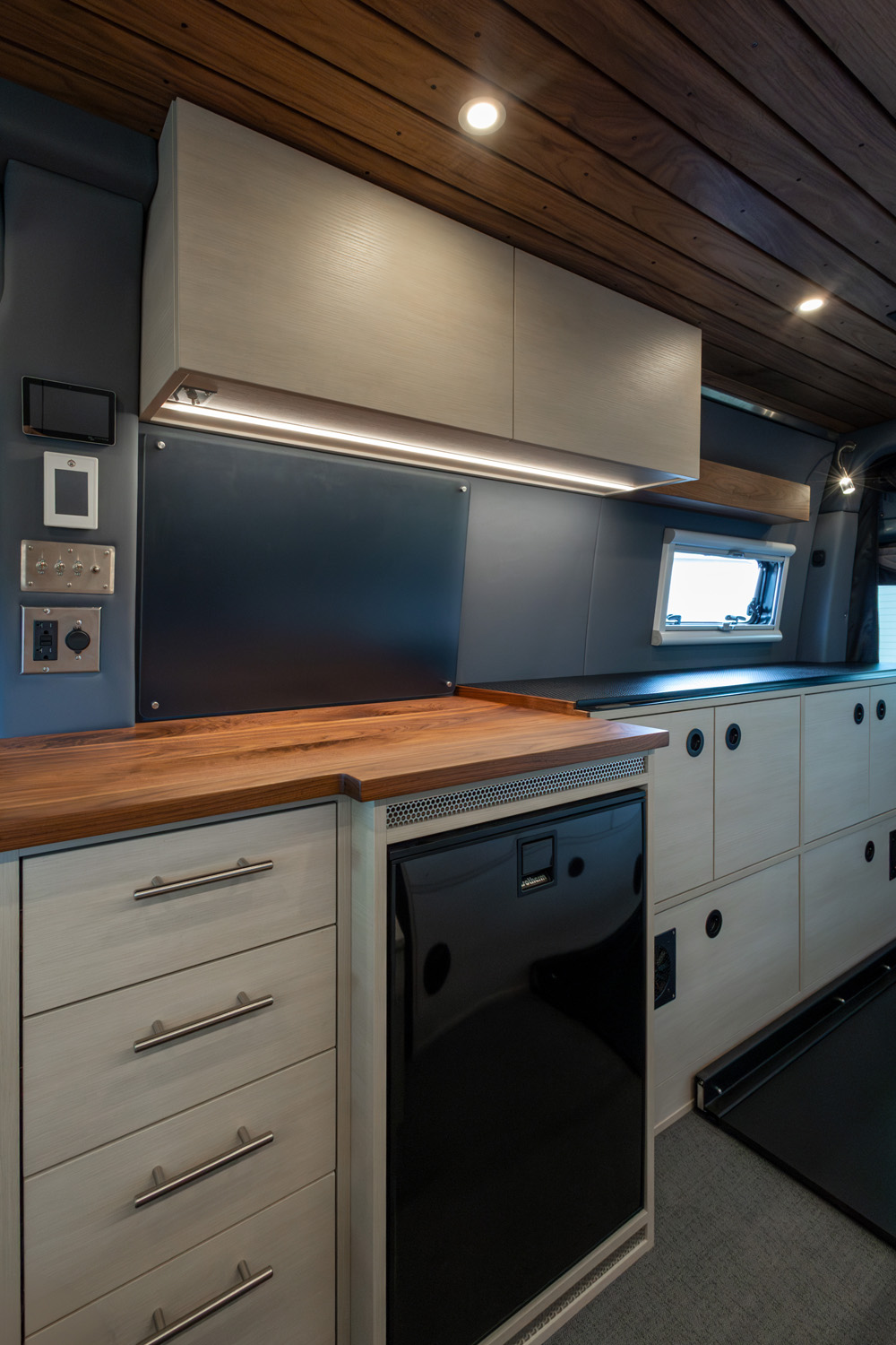 SAGA Vans Sprinter 170 interior galley and overhead cabinet